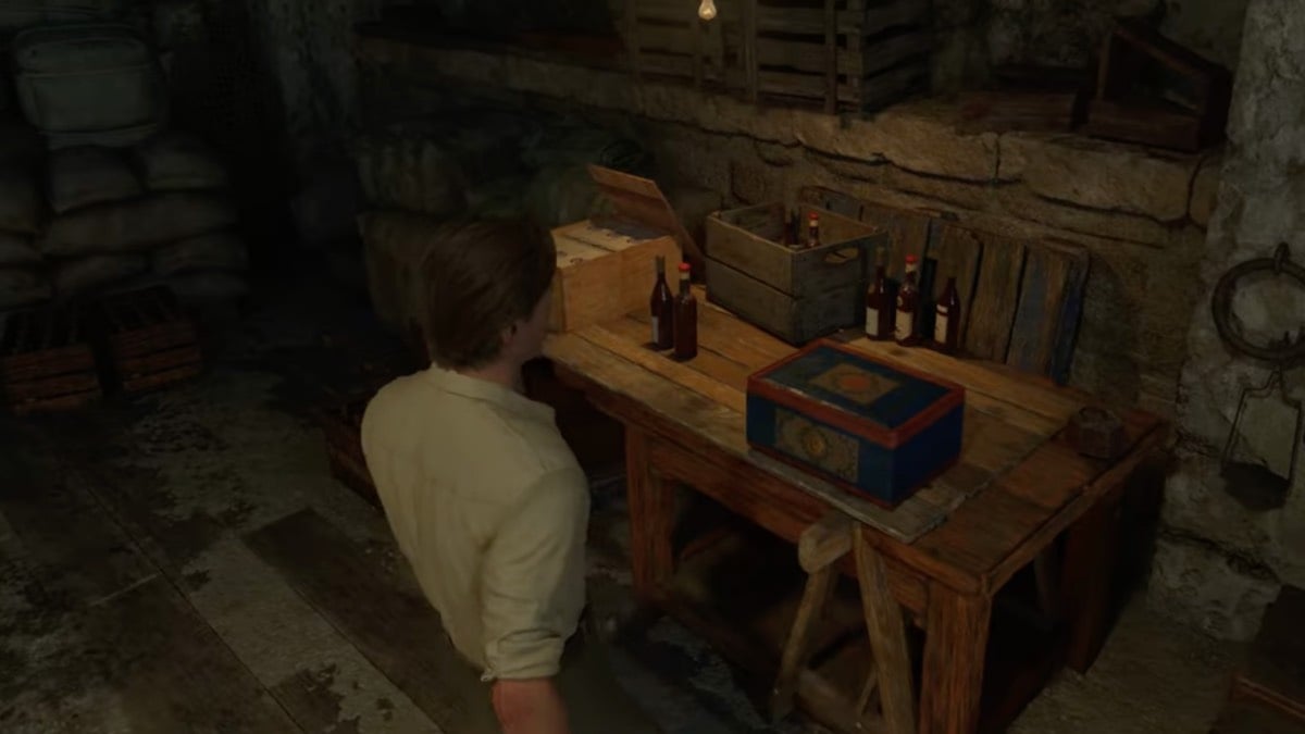 man in white shirt looking at box